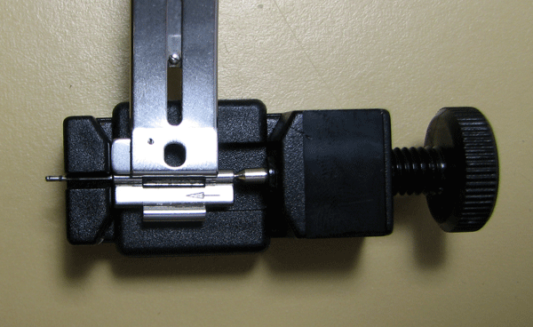 using the tool to remove a pin