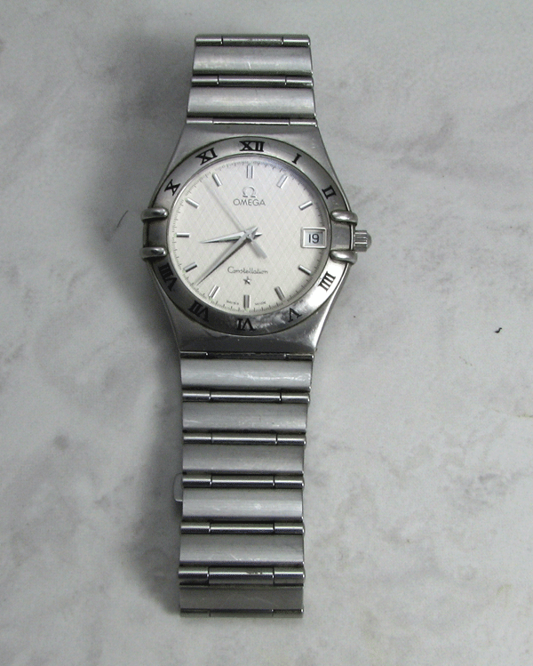 A watch with a steel bracelet